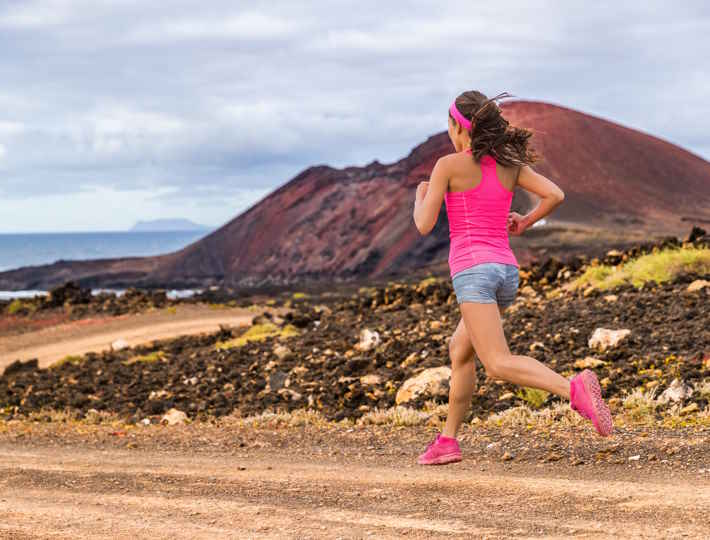 Hydration Tips for Long Distance Runners, woman in pink